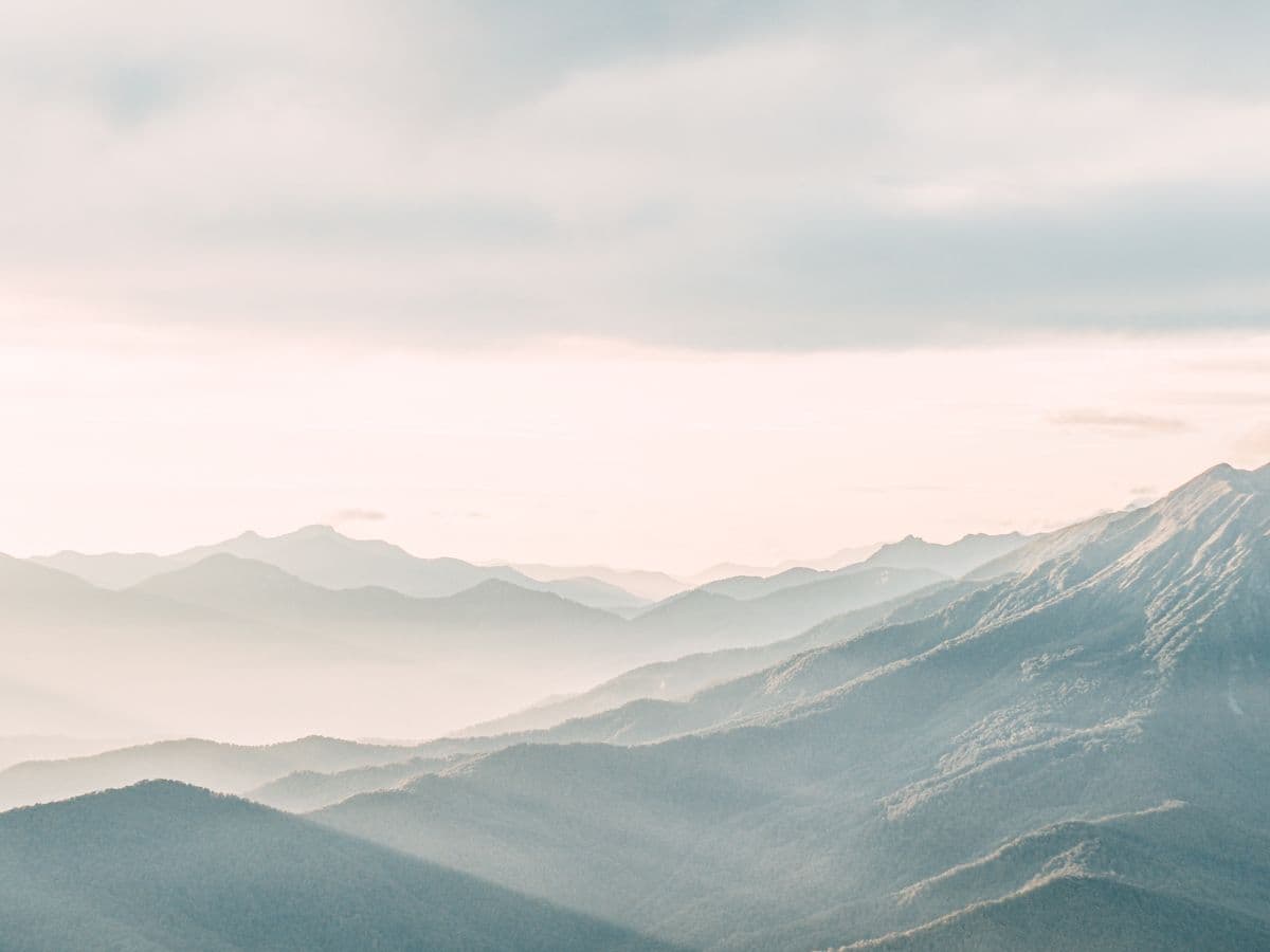 Hazy mountain ridgelines at dawn