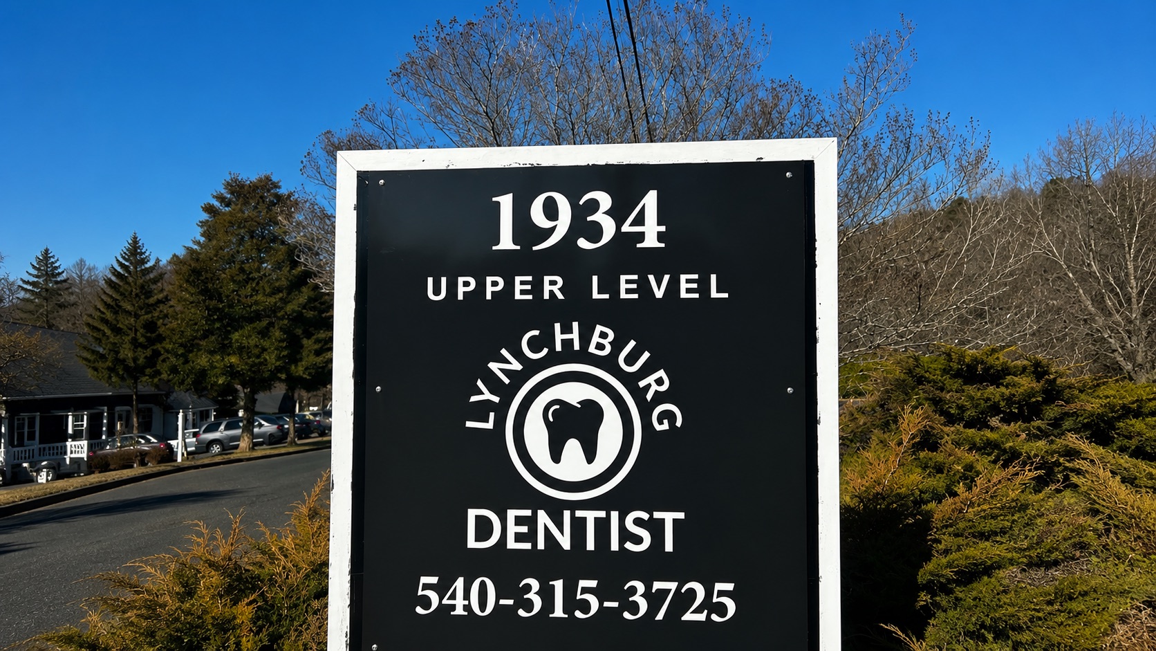 Lynchburg Dentist signage at the entrance to the parking lot
