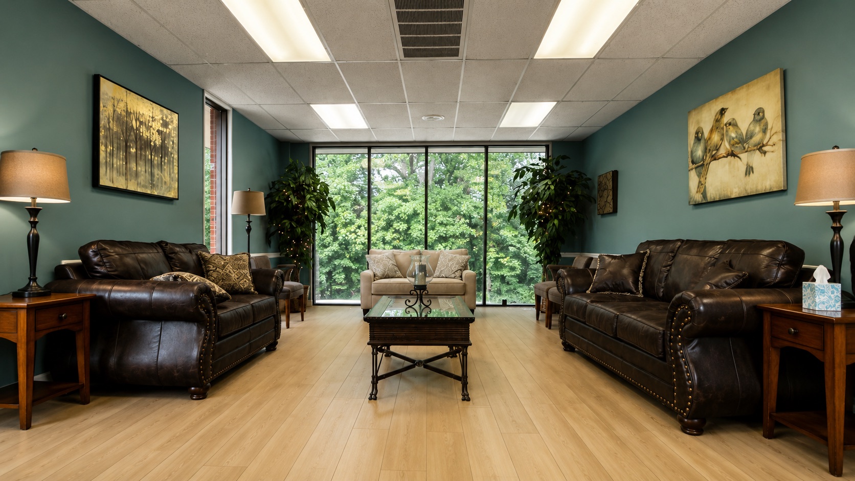 Waiting room with leather couches and natural light